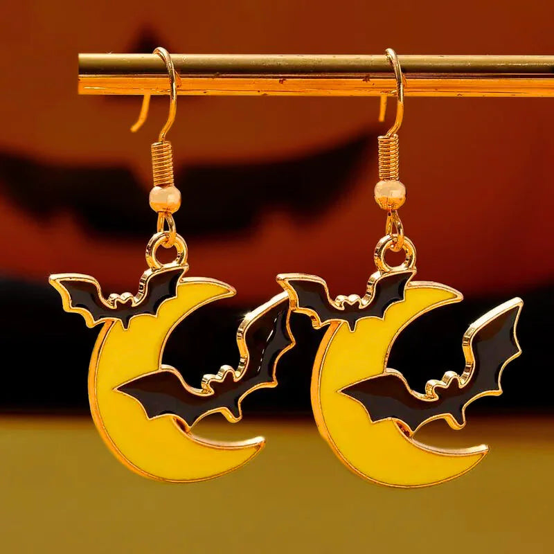 bat with moon on  a stick