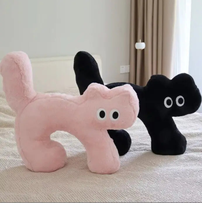 both the pink and black plush dolls