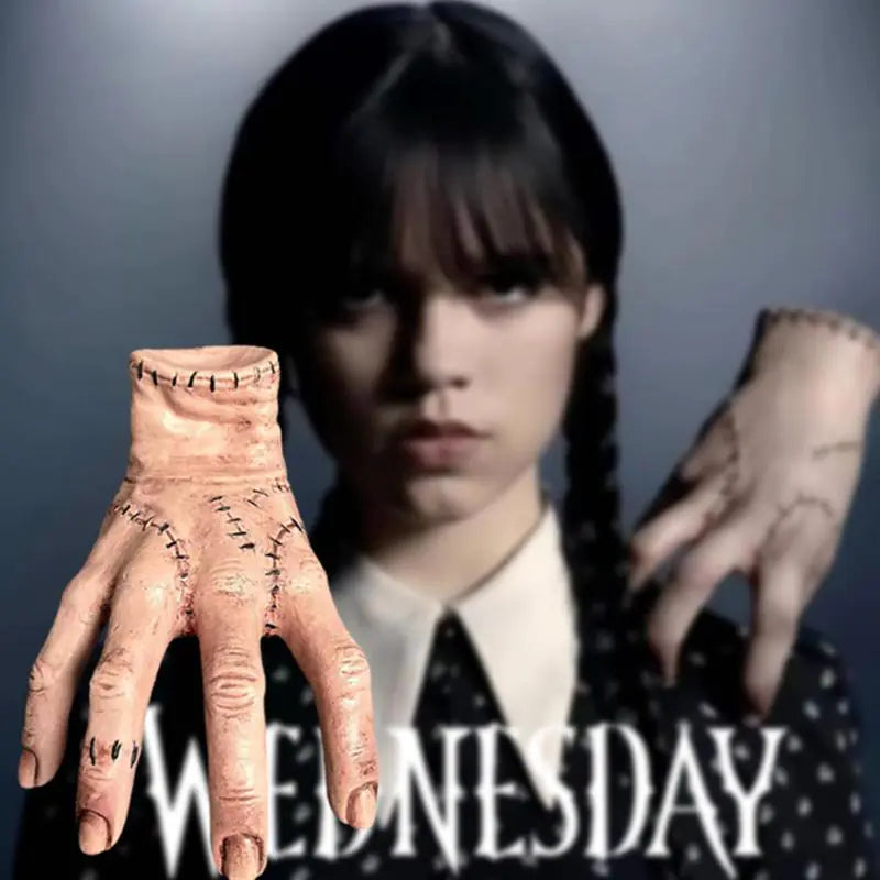 hand in front of  Wednesday